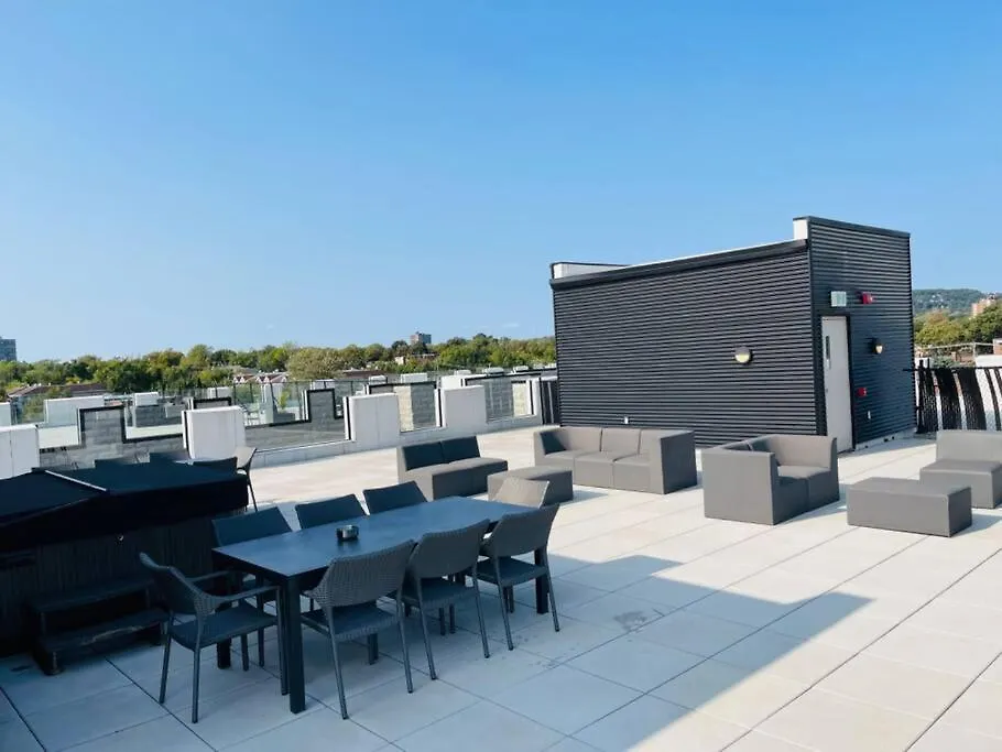 Апартаменты Le Bijou Airhome One Or Two Bedroom Suite Монреаль